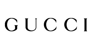 The image features a logo of the luxury fashion brand Gucci, which is characterized by its distinctive interlocking  G  design.
